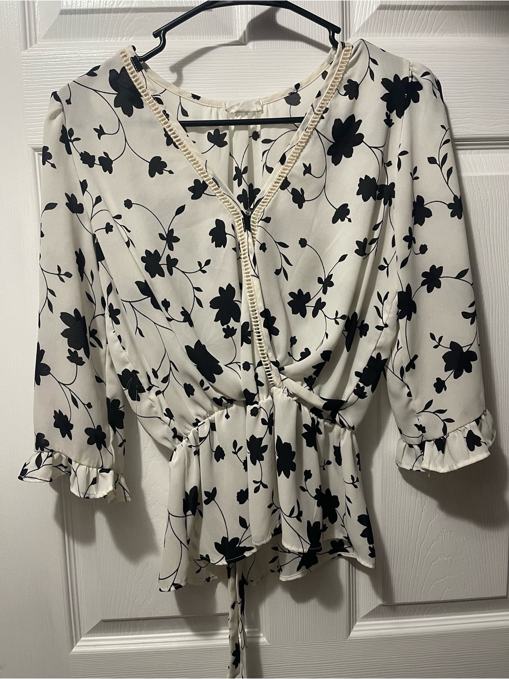 Sienna Sky Black Floral Wrap Peplum Blouse on Ivory
